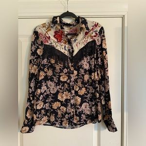 Super cute woman’s western floral and fringe button up